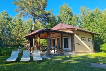 Коттедж 425 м² на участке 18 сот.