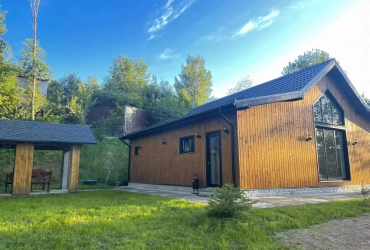 Коттедж 125 м² на участке 18 сот.